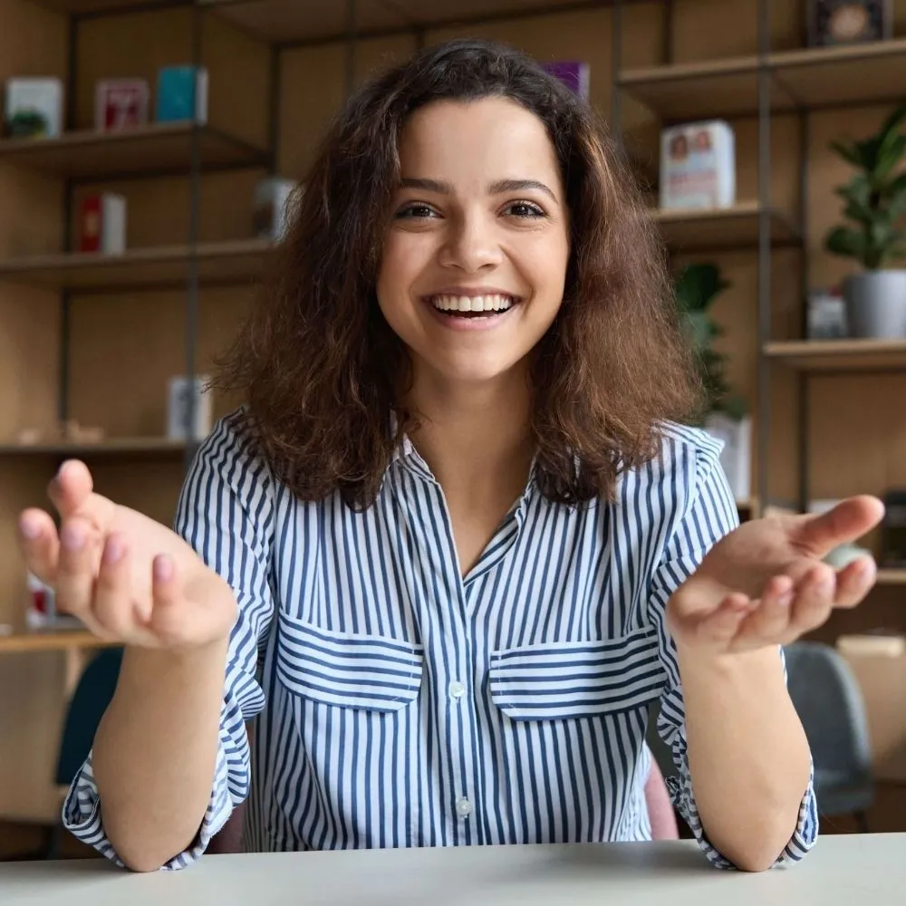 happy-latin-young-woman-online-teacher-or-student-T52LK2F_17.webp
